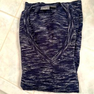 Imported
Ribbed V-neck 
100% cotton